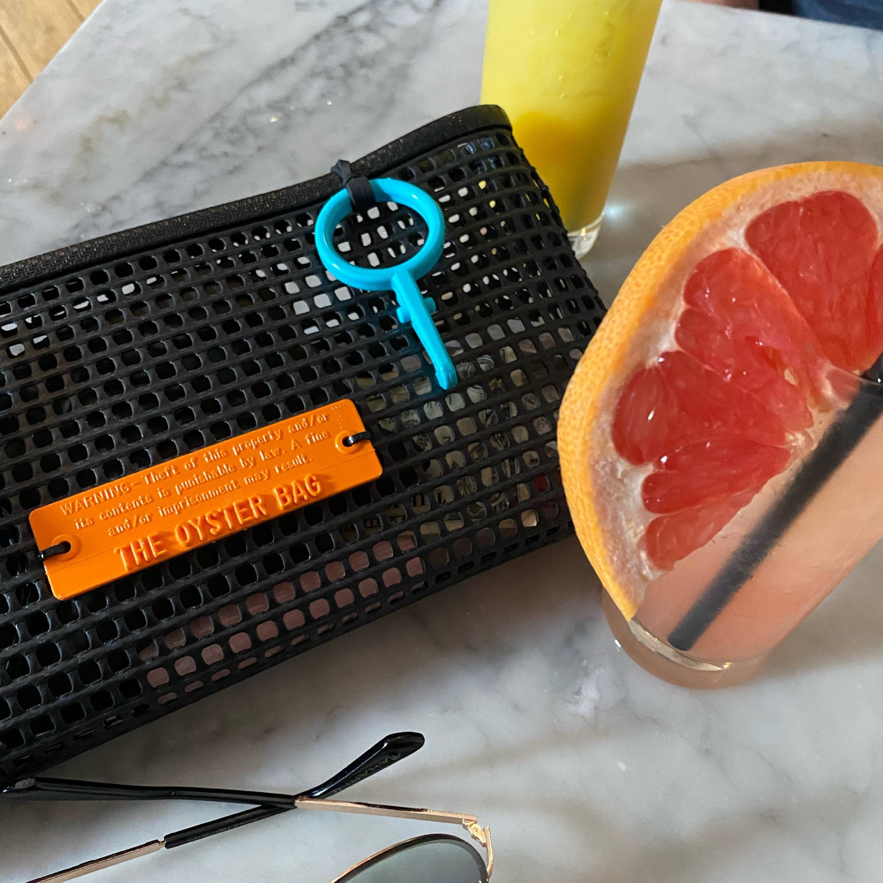 THE CLUTCH - Oyster Bag