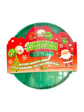 A 1-pack of 'Christmas Dumplings' by Super7, featuring a green glittery squishy toy shaped like a dumpling inside a red and green retail blister pack with Santa graphics.