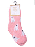 A pink fuzzy sock for kids with a white ghost pattern, hanging from a black hanger with a 'Royal Standard' brand tag on a white background.