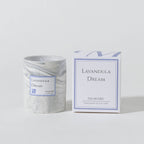 Marble-patterned candle and its packaging labeled 'Lavandula Dream' on a light gray background