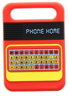 A retro-style toy phone or educational toy with a red body, yellow keypad border, and a black display screen showing the text 'PHONE HOME'.