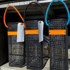 FULL MOOD black oyster mesh wine caddy with orange accents and harvest tag for carrying wine bottles