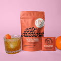 FULL MOOD Stir Sessions blood orange old fashioned cocktail mix pouch and single packet with a prepared drink