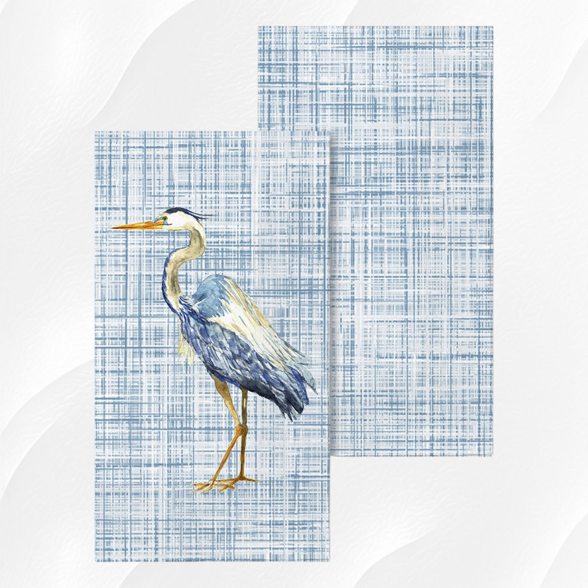 FULL MOOD Blue Heron guest napkins featuring a watercolor bird design on a blue and white textured cross-hatch background