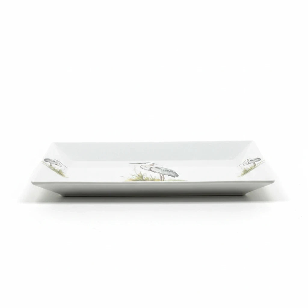 FULL MOOD rectangular porcelain serving platter featuring an elegant blue heron motif on a white background