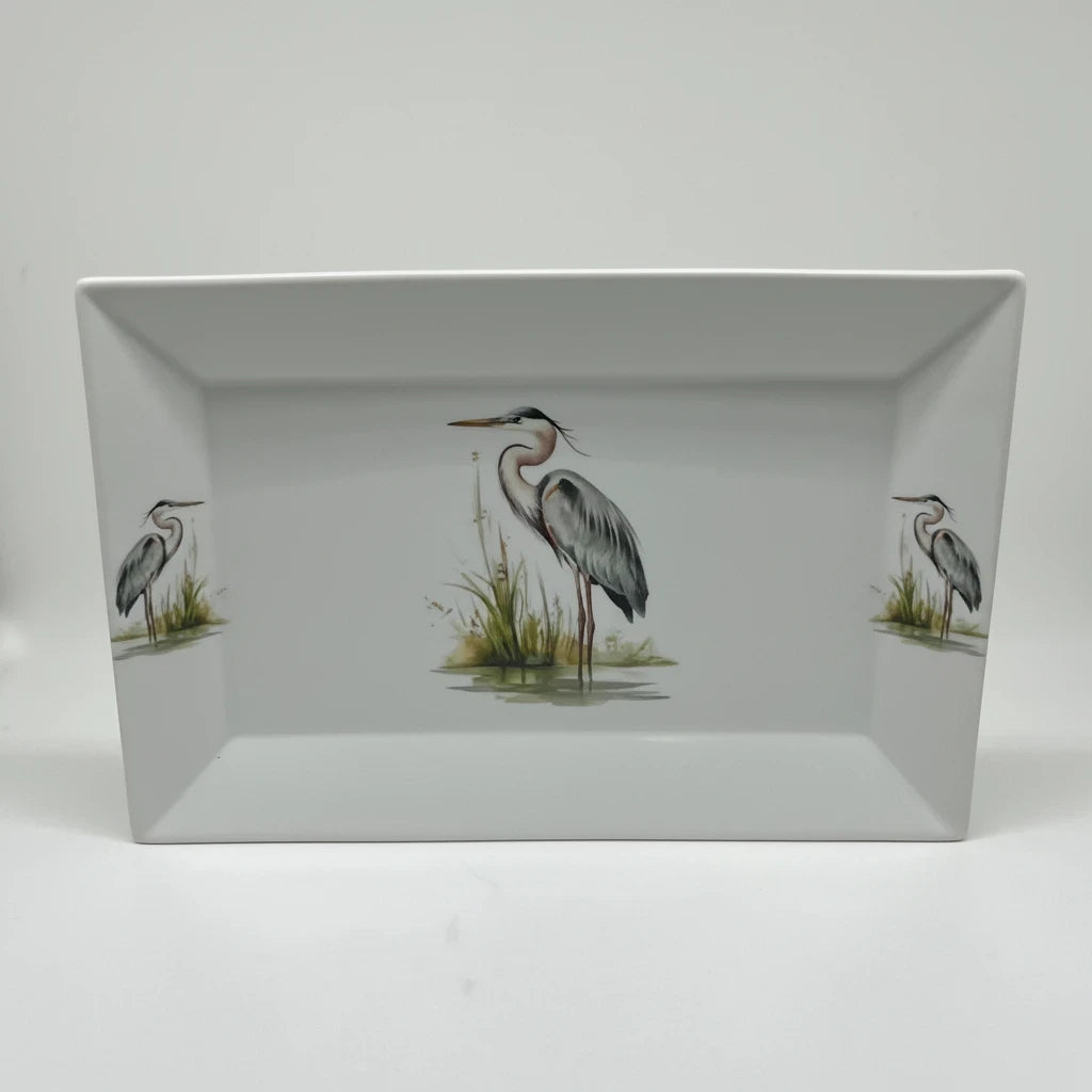 FULL MOOD rectangular porcelain serving platter featuring a detailed blue heron bird motif on a white background.
