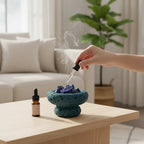 FULL MOOD Caribbean aromatherapy diffuser with blue sodalite crystals and fragrance oil dropper in a home setting