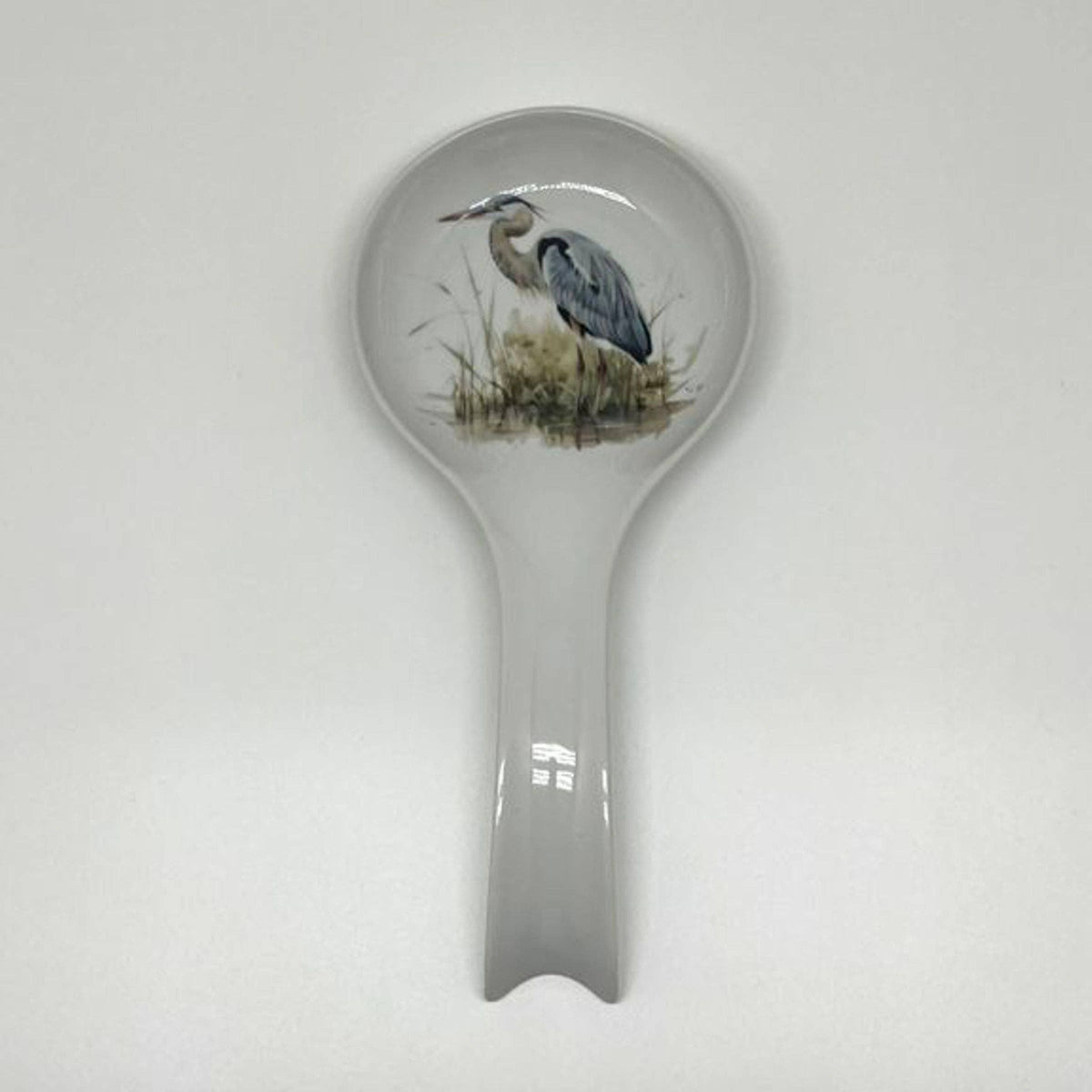 FULL MOOD ceramic spoon rest featuring a detailed blue heron illustration on a white glazed finish for kitchen decor