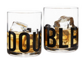 FULL MOOD set of two clear glass whiskey tumblers featuring bold black DOUBLE typography and ice cubes