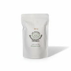 FULL MOOD DR MONKEYS coffee caramels in a white resealable pouch with a monkey logo and bold espresso branding