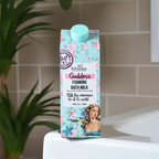 FULL MOOD Goddess Foaming Bath Milk in a floral carton with vintage art, sitting on a white bathroom ledge.