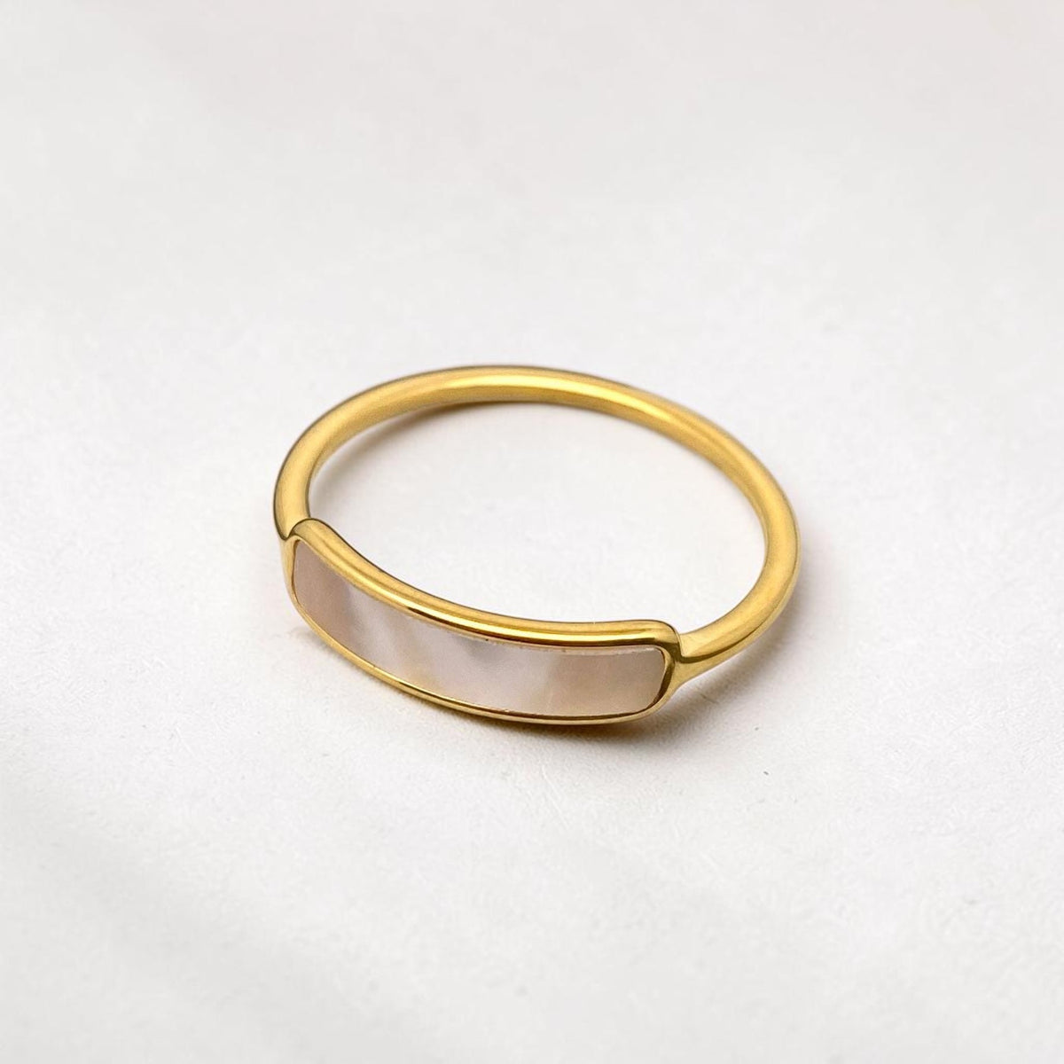 FULL MOOD 18K gold plated stainless steel ring featuring a polished curved shell inlay on a minimalist band