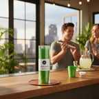 FULL MOOD set of 10 green plastic shot glasses with Salt, Tequila, Lime, Repeat text on a bar counter at a party.