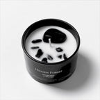 FULL MOOD Hidden Forest soy wax candle in a black glass jar with embedded polished black gemstones