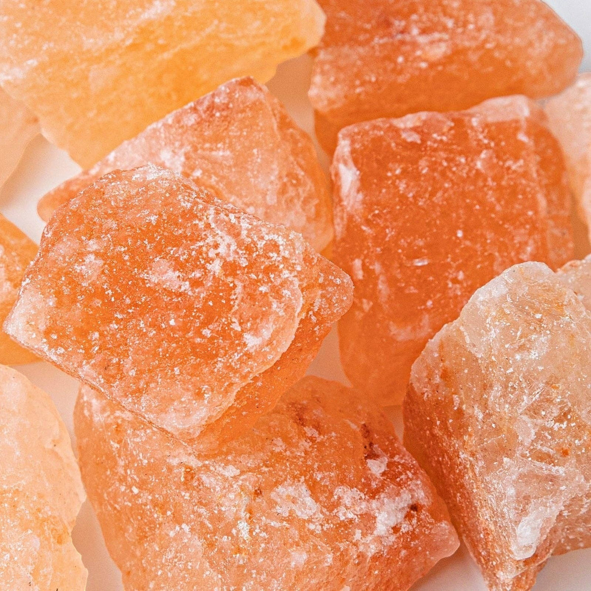 FULL MOOD raw Himalayan salt crystals in shades of orange and pink for use in an aromatic fragrance diffuser