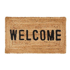 FULL MOOD woven jute doormat with black "WELCOME" lettering. Natural, rustic texture.
