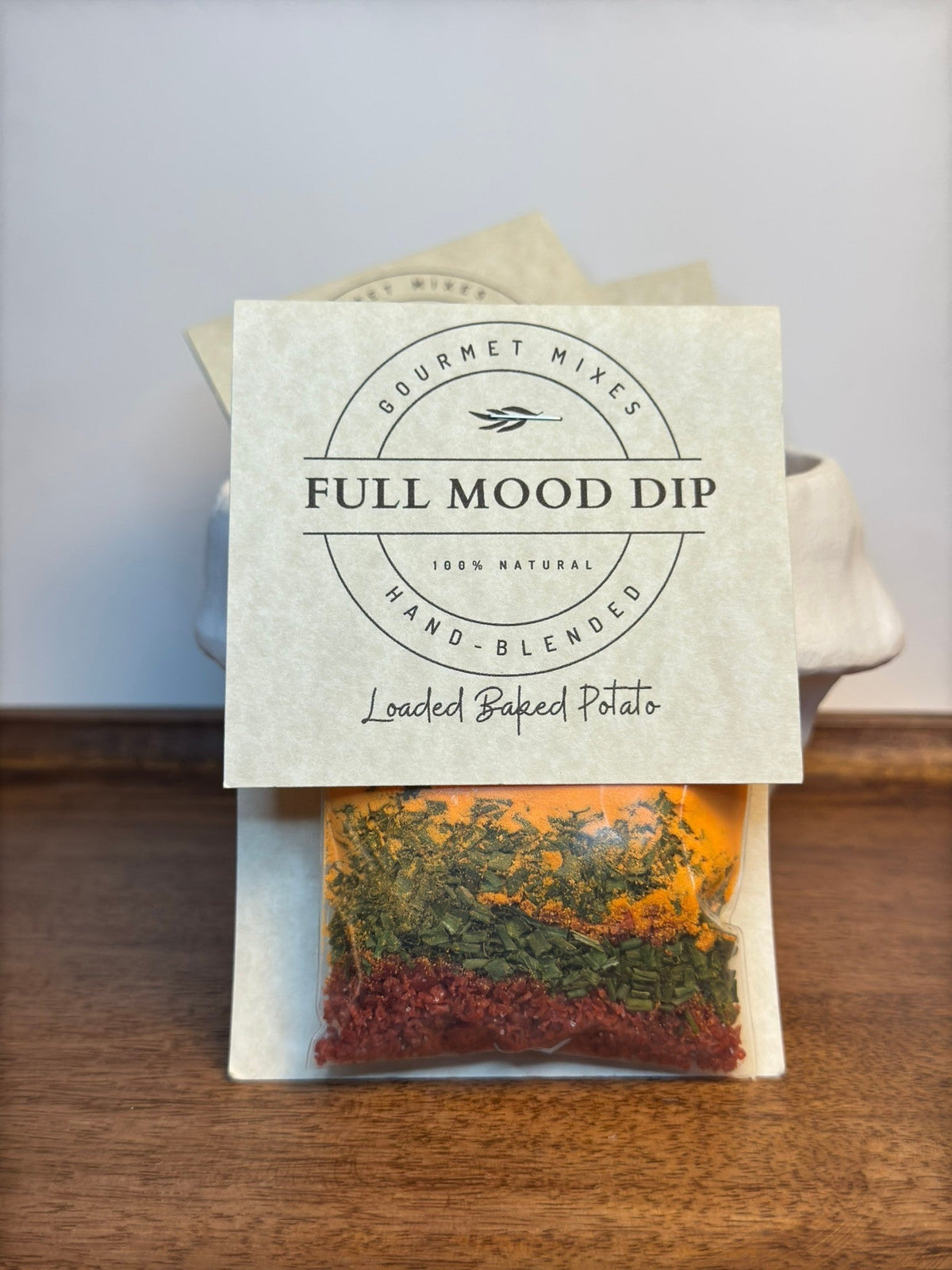 FULL MOOD Loaded Baked Potato seasoning dip mix packet with visible layers of cheddar, bacon, and chives.