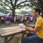 FULL MOOD 20oz styrofoam cup with Let the Band Play Neck design on a wooden table at an LSU tailgate party