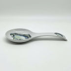 FULL MOOD white porcelain oyster spoon rest with a painted shell design for kitchen countertop organization