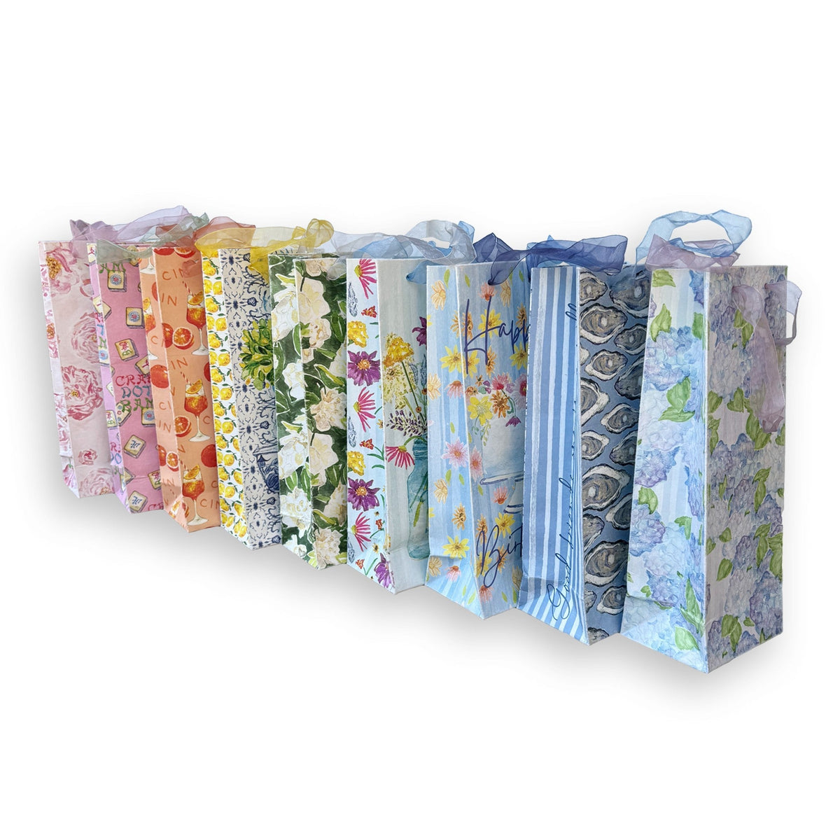 FULL MOOD collection of handmade paper wine gift bags featuring various colorful floral, fruit, and oyster patterns.