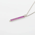 FULL MOOD Queen pendant necklace featuring a purple enamel vertical bar with silver lettering on a delicate chain