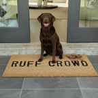 FULL MOOD Ruff Crowd natural coir doormat with black text, featuring a chocolate lab dog sitting on it.