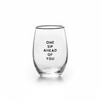 FULL MOOD stemless wine glass featuring the black text One Sip Ahead of You on clear glass against a white background
