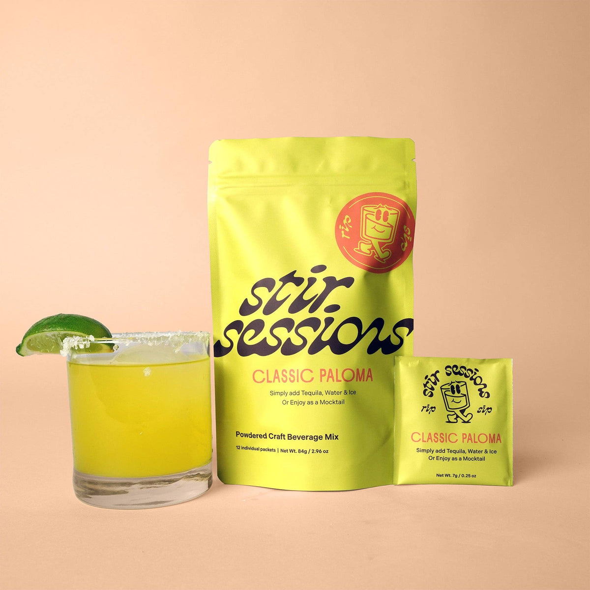 FULL MOOD Stir Sessions Classic Paloma cocktail mix pouch and packet with a prepared margarita on a beige background