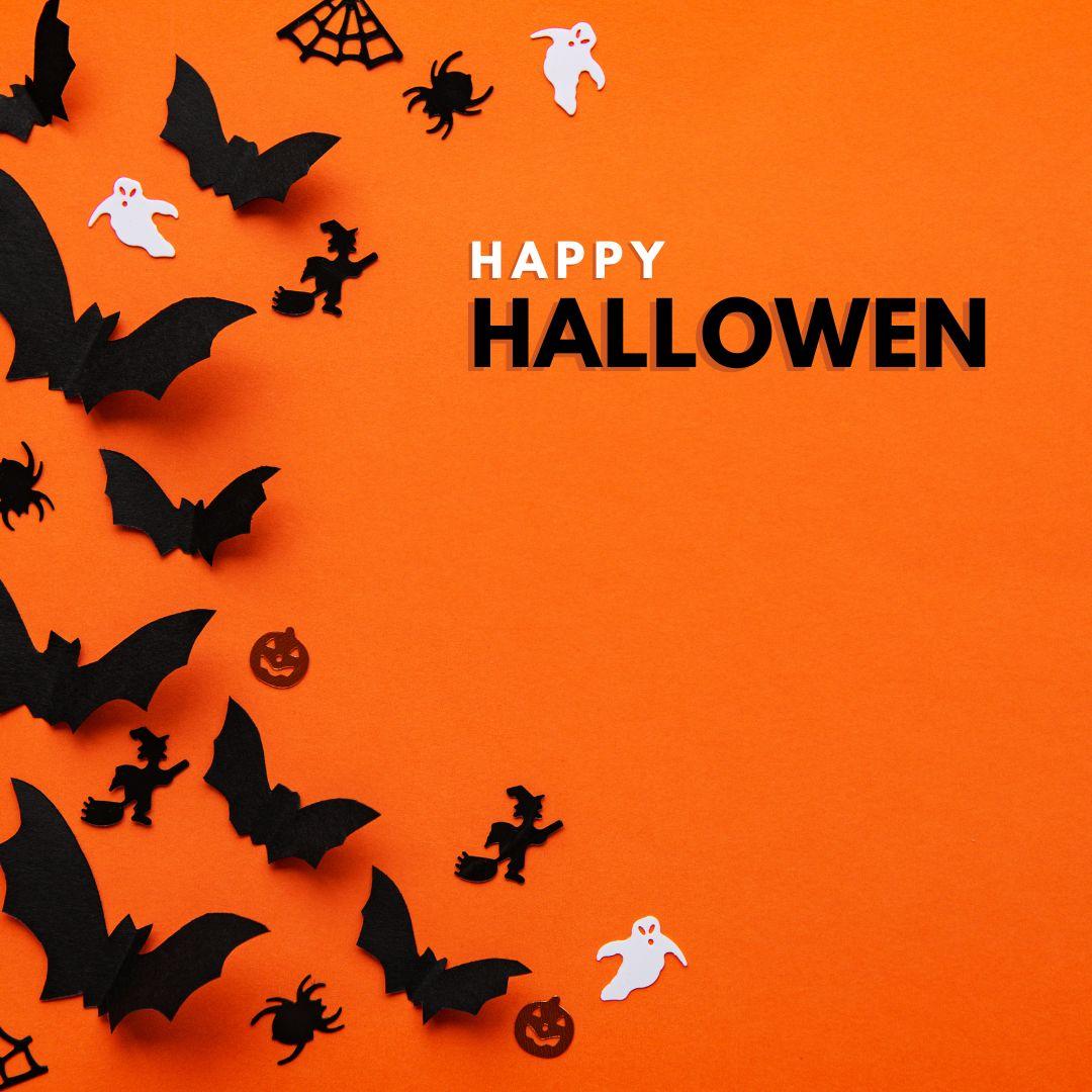 FULL MOOD Tangerine Luster glass set featuring iridescent rainbow shimmer on an orange Halloween themed background