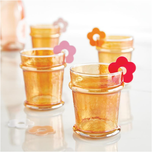 FULL MOOD tangerine luster glass set with iridescent finish and colorful flower-shaped drink markers on rims