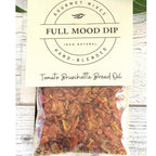 FULL MOOD Tomato Bruschetta seasoning dip mix in a clear pouch with a cream label on a rustic wooden surface.