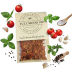 FULL MOOD Tomato Bruschetta seasoning mix with dried tomatoes, basil, garlic, and peppercorns on a marble surface.