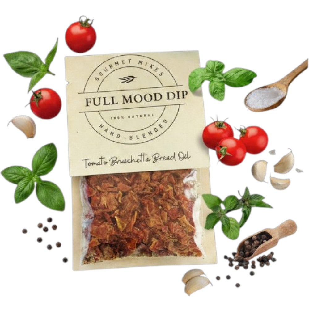 FULL MOOD Tomato Bruschetta seasoning mix with dried tomatoes, basil, garlic, and peppercorns on a marble surface.