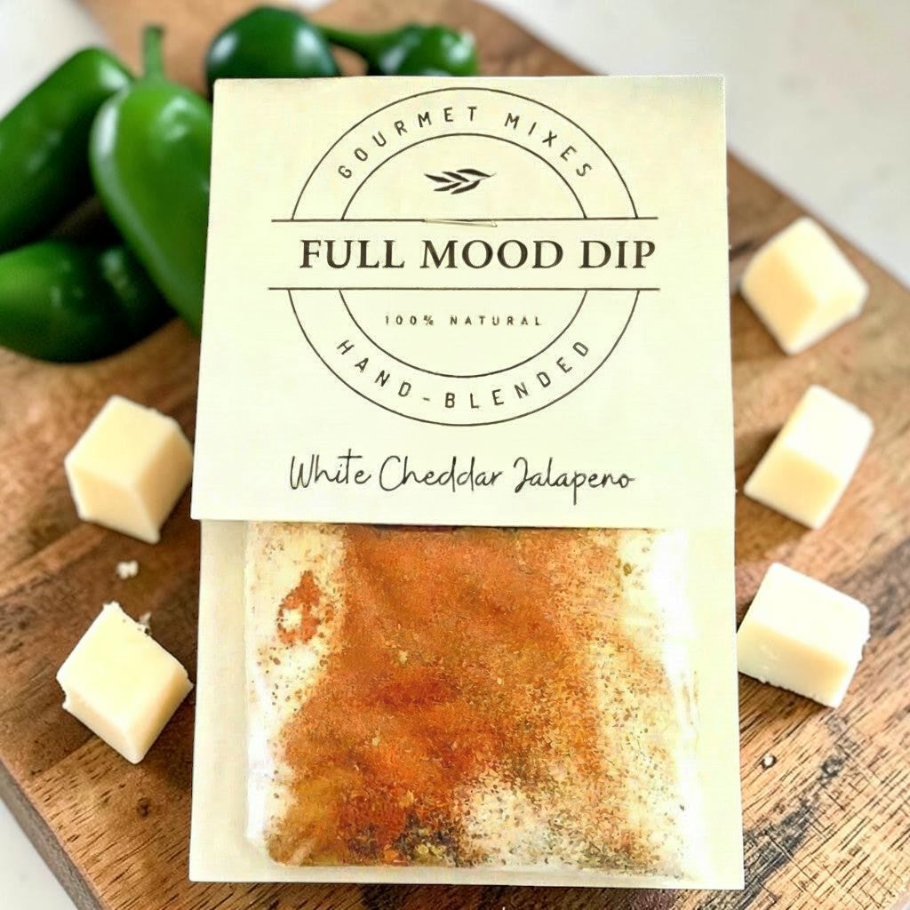 FULL MOOD White Cheddar Jalapeno dip mix packet featuring a blend of cheddar powder, red pepper flakes, and spices.