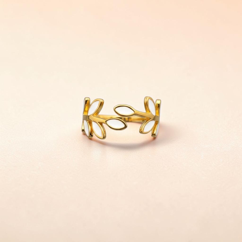 FULL MOOD adjustable ring featuring white enamel leaves on 18K gold-plated stainless steel in a botanical design