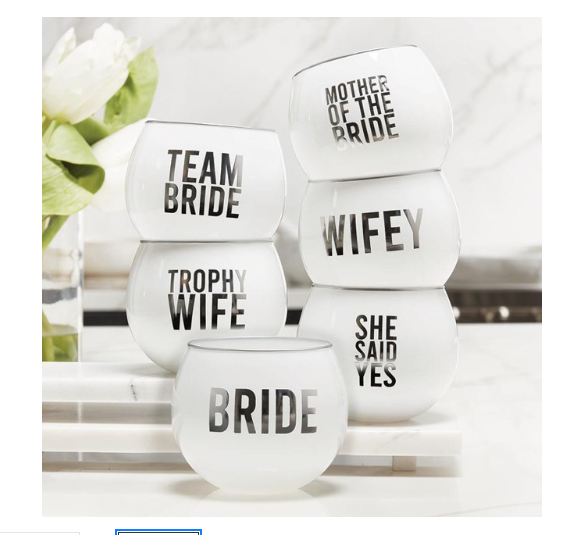 FULL MOOD white glass wine tumblers with metallic silver lettering and rims, stacked on a marble surface.