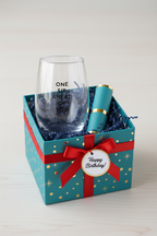 FULL MOOD stemless wine glass with One Sip Ahead of You text, presented in a teal birthday gift box with red ribbon.