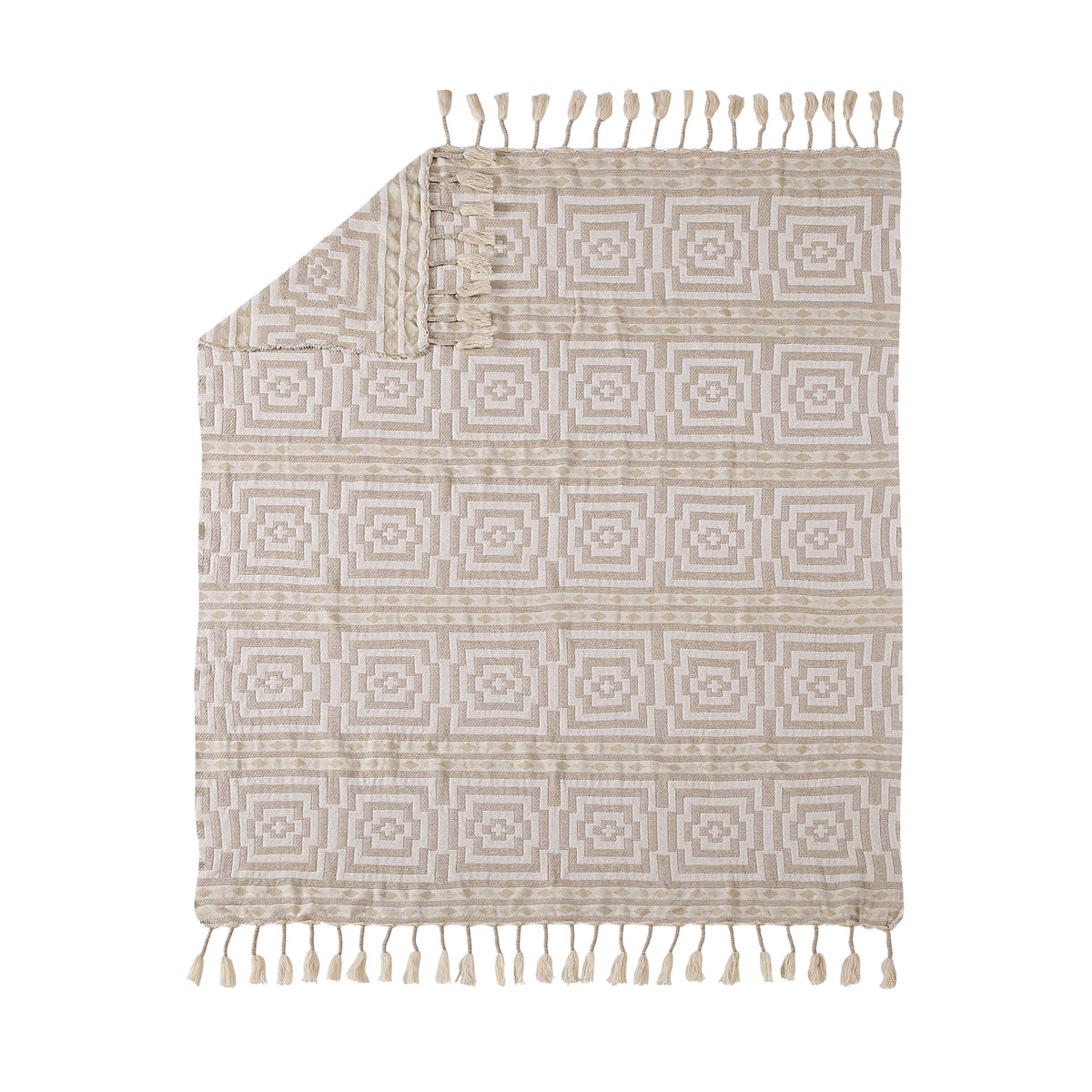 Beige patterned rug with tassels on a white background